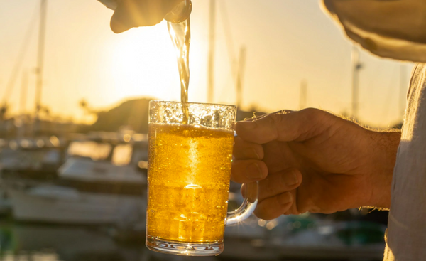 Unbreakable Plastic Beer Mug in front of yatchs