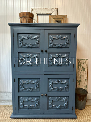 Farmhouse Paint Evolution painted armoire makeover into a bar.