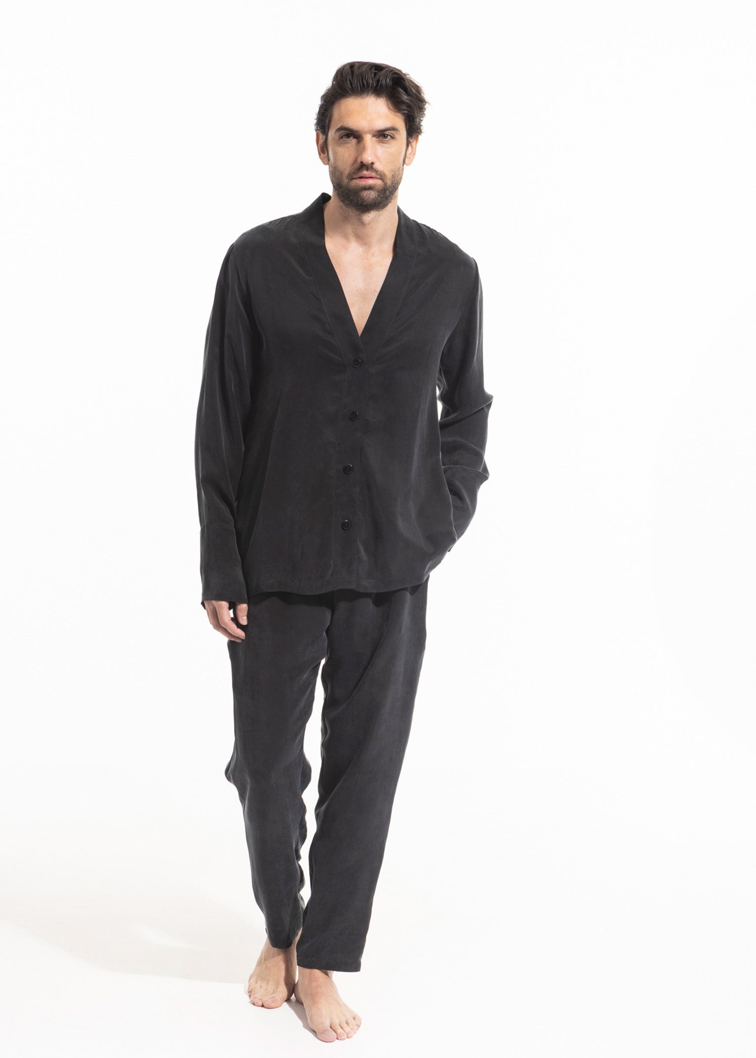 Male Model in unisex Noir harper shirt and charlie pants
