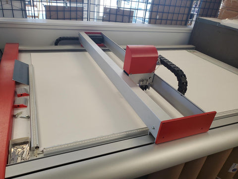 A computer aided mat cutting machine