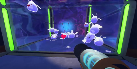 Jugabilidad de Slime Rancher: Un grupo de Slimes en una valla