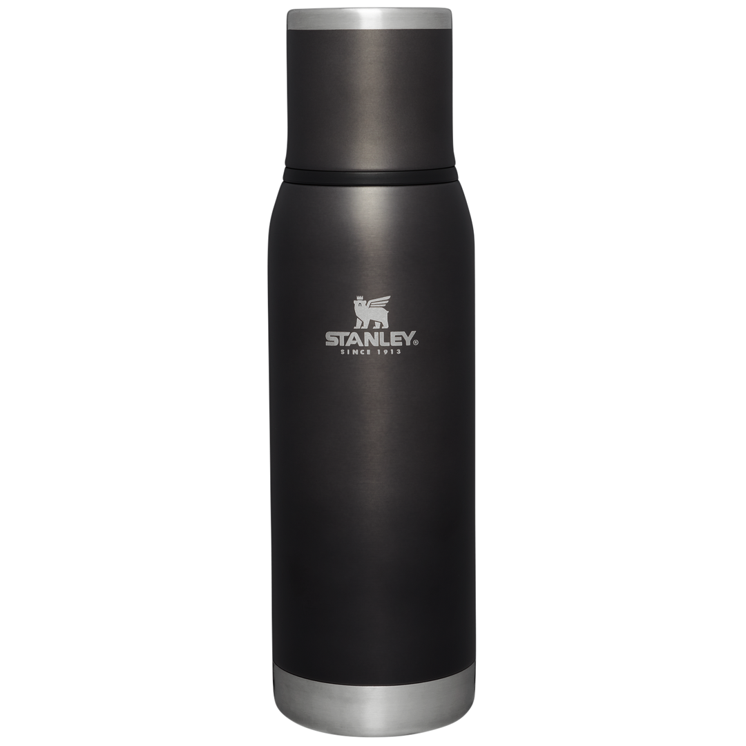 https://cdn.shopify.com/s/files/1/0375/3269/6635/files/B2B_Web_PNG-The-Adventure-To-Go-Bottle-25OZ-Charcoal-Glow-Front.png?v=1704425604&width=1080