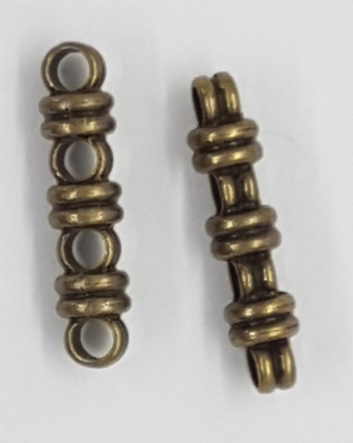 SPACER BARS - 4 HOLE - 27 X 6.5 X 6MM ANTIQUE BRONZE COLOUR – The Bead Lady