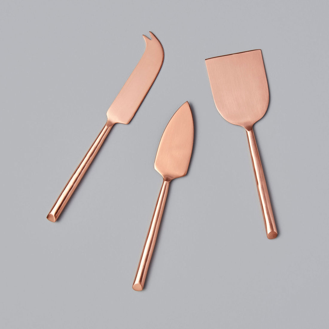 https://cdn.shopify.com/s/files/1/0376/0920/9900/products/Be-Home_Matte-Copper-Cheese-Set-of-3_25-1C.jpg?v=1606334003&width=1100