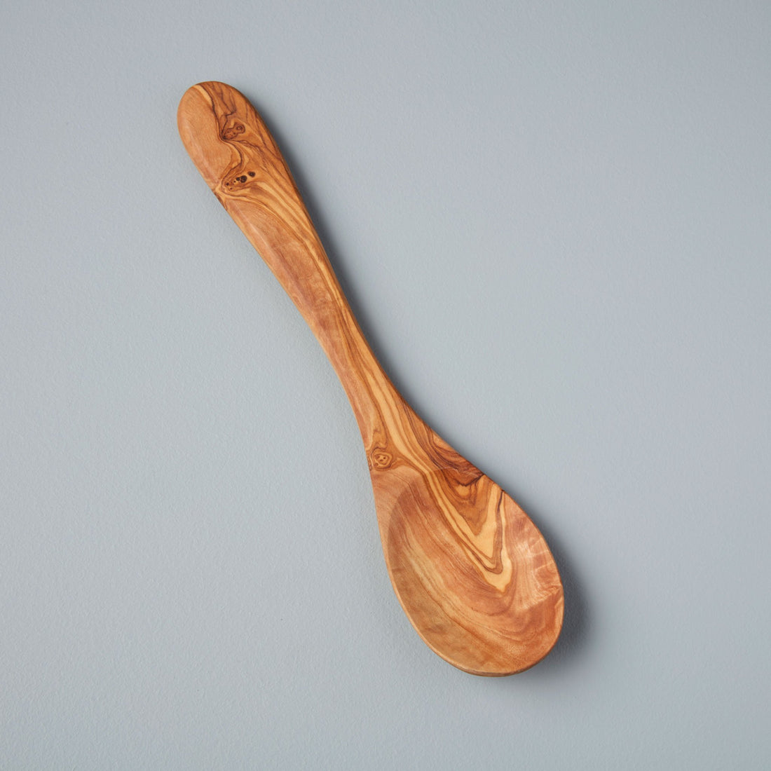 https://cdn.shopify.com/s/files/1/0376/0920/9900/products/Be-Home_Olive-Wood-Cooking-Spoon_51-02_1424c58f-7d07-44ba-b64e-3f682fc991ac.jpg?v=1683235050&width=1100