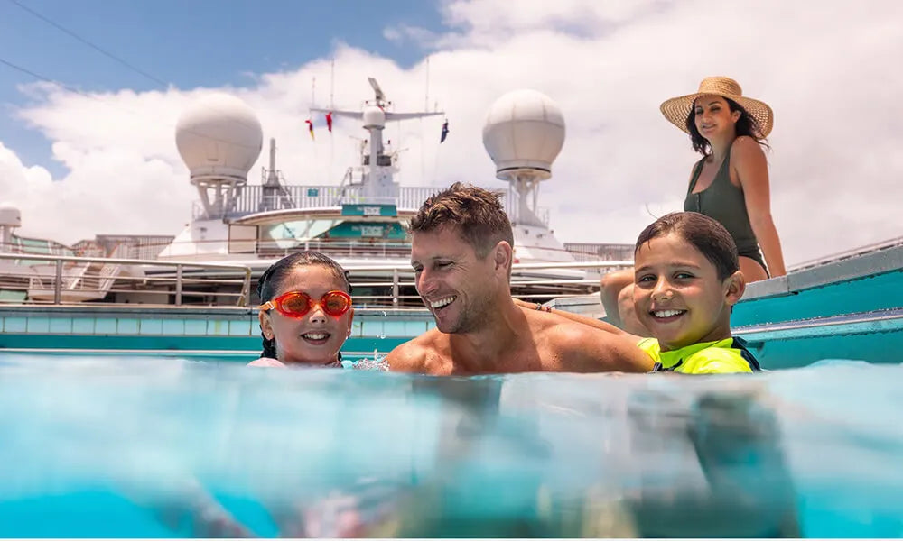 image of family in swimming pool on a cruise ship