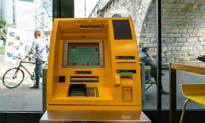 image of a yellow international ATM for foreign currency