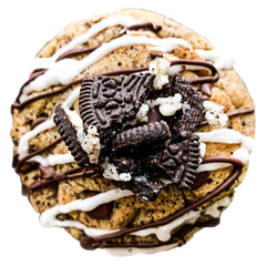 The Big O - Oreo cookie base, with double stuffed Oreo inside, chocolate chips, chocolate and vanilla icing drizzle, topped with a Oreo crumble 