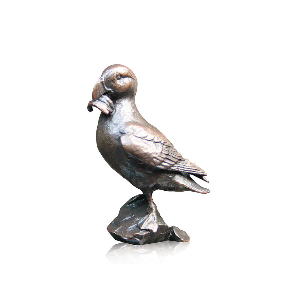 Bronze sculpture puffin with fish