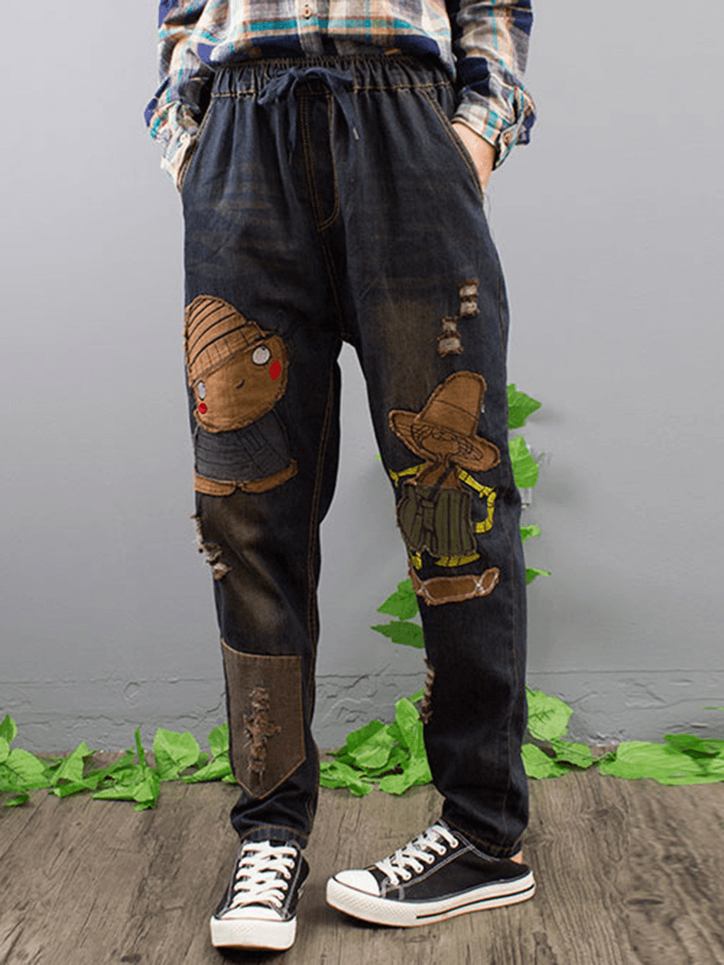 Jeans de mezclilla con cintura elástica y patchwork bordado