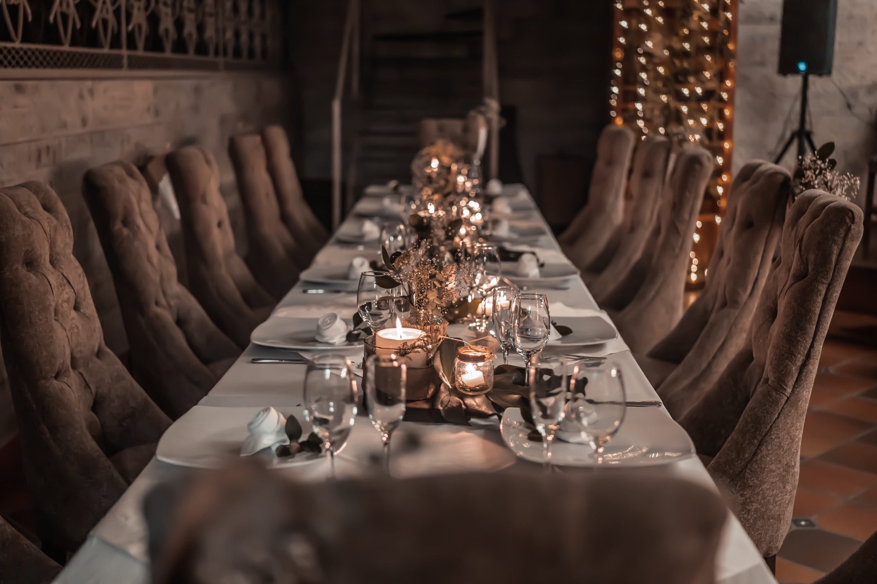 Candles on a large Thanksgiving table