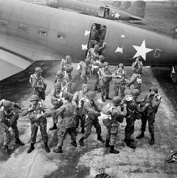 Paratroopers of the 503rd US Parachute Infantry Regiment prepare to board a C-47 Skytrain of the 60th Troop Carrier Group at Aldermaston, 23 September 1942