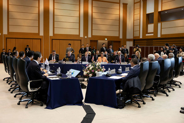 Defence Secretary, Grant Shapps (centre), seen here at a trilateral meeting with his Italian and Japanese counterparts in Tokyo Japan, where they signed a Treaty regarding the Global Combat Air Programme