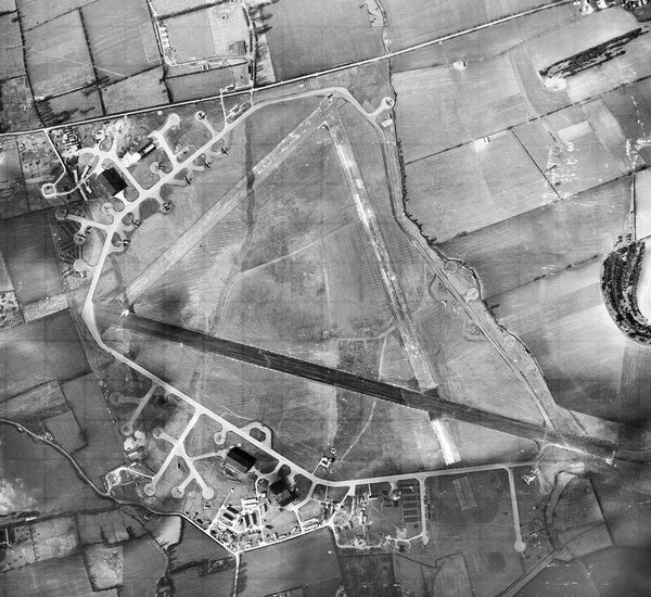 Aerial photograph of RAF Cheddington looking north, the bomb dump at the top, the control tower and technical site are at the bottom, 3 March 1944
