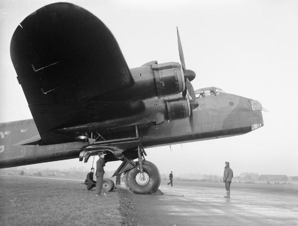 7 Squadron Stirling being prepared for a flight at RAF Leeming in 1941