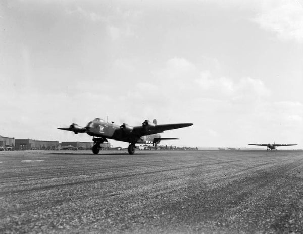 A Short Stirling of No. 295 Squadron RAF, taking off from RAF Harwell towing an Airspeed Horsa glider, 17 September 1944