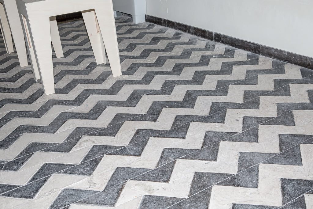 Black and white zig zag patterned floor