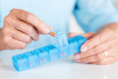 Pill dispenser for elderly