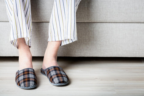 Elderly person with slippers