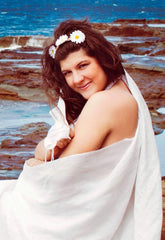 A bride at the ocean photographed with film