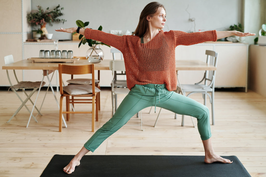 woman practicing warrior II