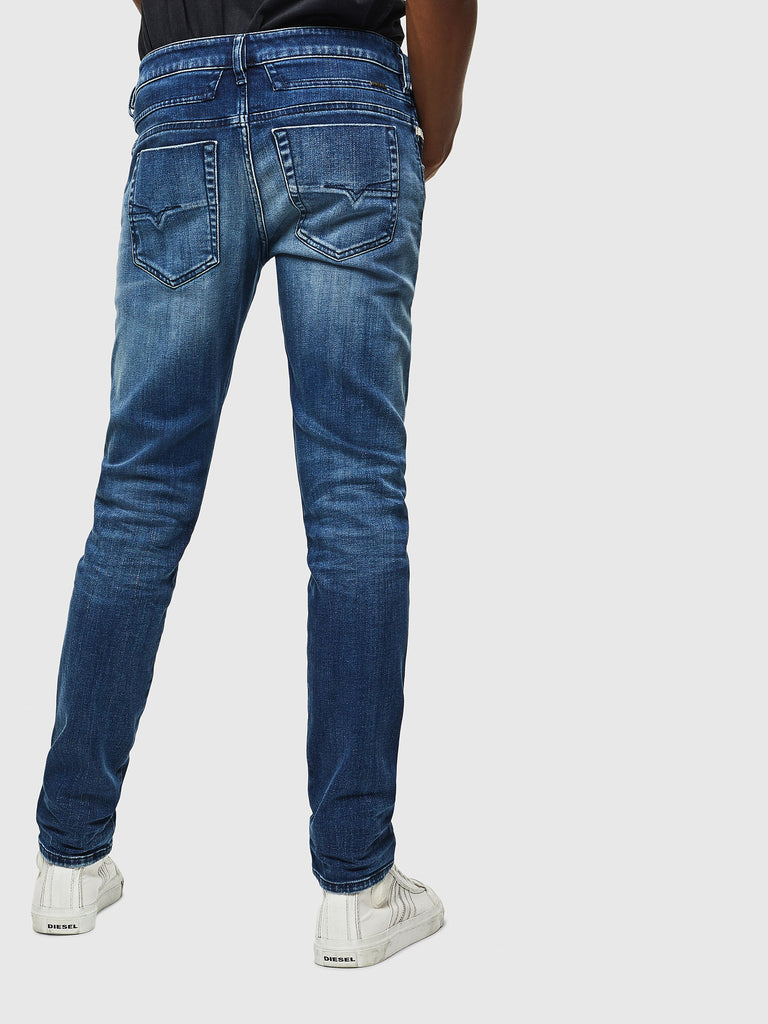 tapered diesel jeans