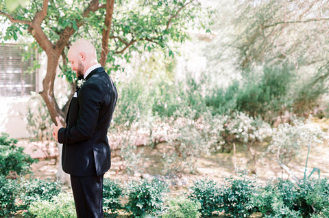 Groom awaits the first look at his bride.