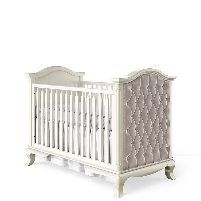 white upholstered crib