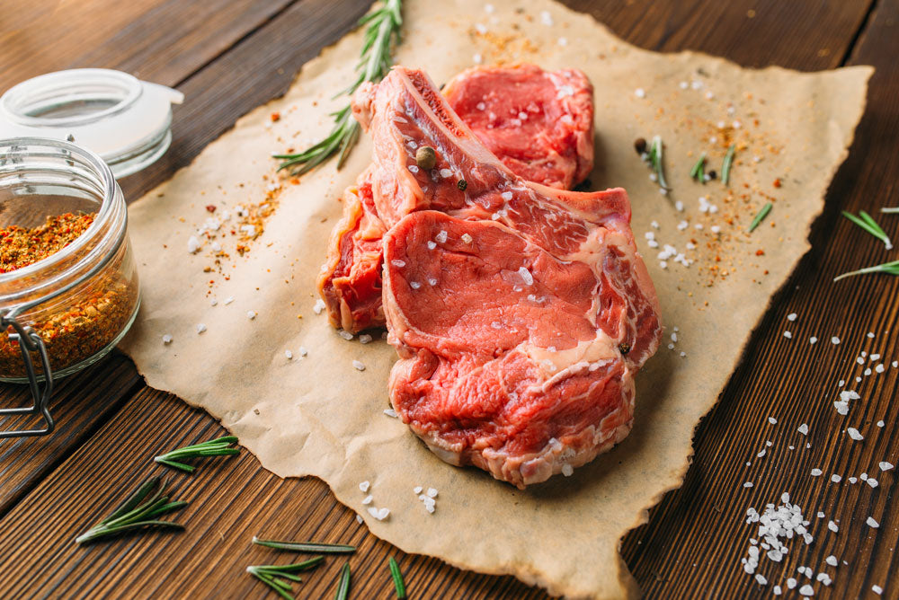 Red meat on a table which is bad for brain health