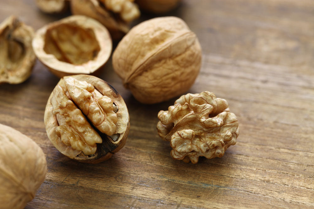 cracked open walnut which contains brain boosting properties