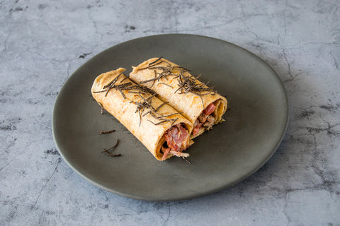 Crepe con confit de pato y trufa negra