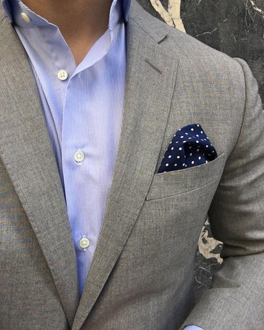 Blue shirt light grey suit