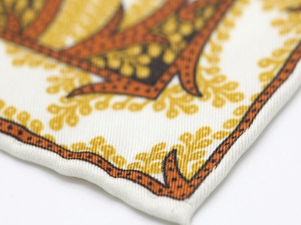 white and gold paisley pocket square