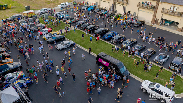 Aerial view of a crowd looking at goldRush Rally cars