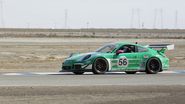 Oloi's 2014 Porsche 911 GT3 on the track at Buttonwillow Raceway