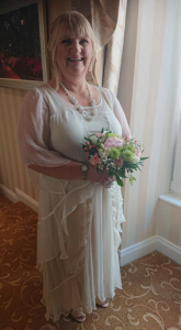 Geraldine wearing a white wedding dress from wardrobeshop