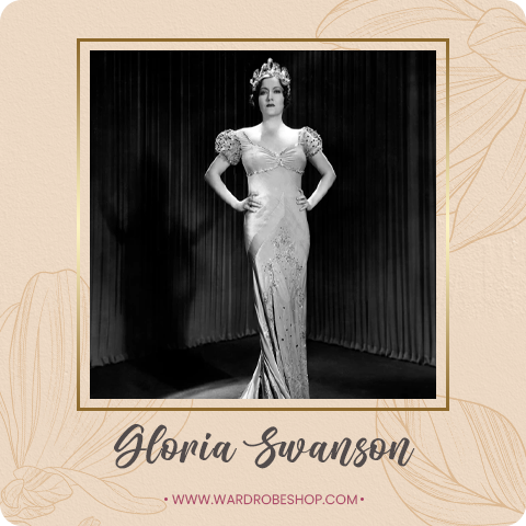 Hollywood actress Gloria Swanson wearing a beautiful long dress