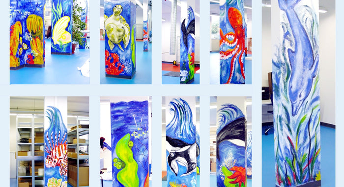 künstlerisch bemalte Säulen des AquaClic-Werks in Zürich-Oerlikon