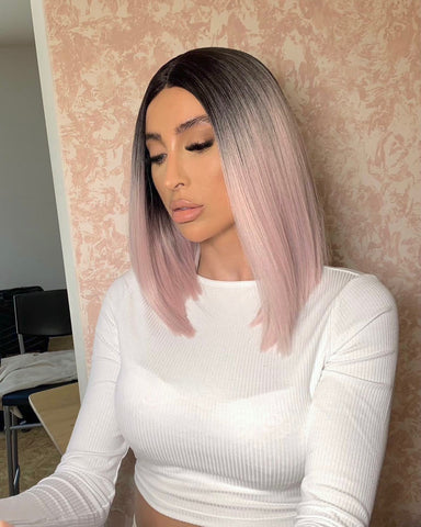 Gorgeous lady wearing a pink ombre long bob wig