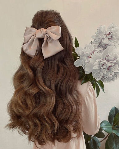 Pretty hair with elegant bow hair accessory