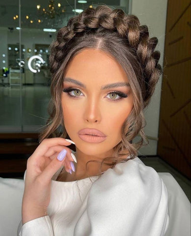 Beautiful woman with braided updo hairstyle