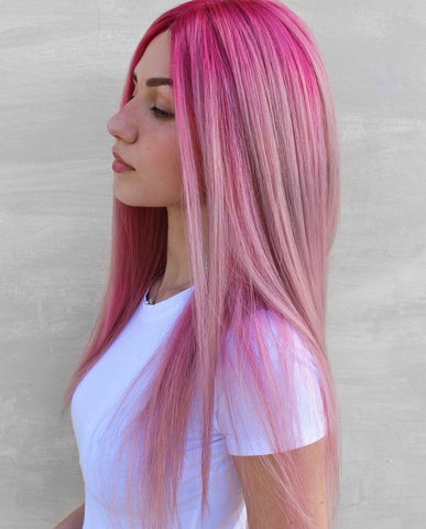Gorgeous woman with pastel pink highlights