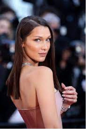 bella hadid with brown straight chic hairstyle on red carpet
