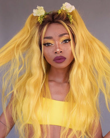 Stunning black woman with daffodil yellow hair color