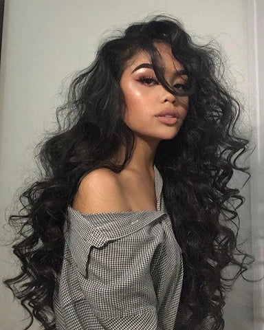 Taurus woman wearing long loose waves as a hairstyle