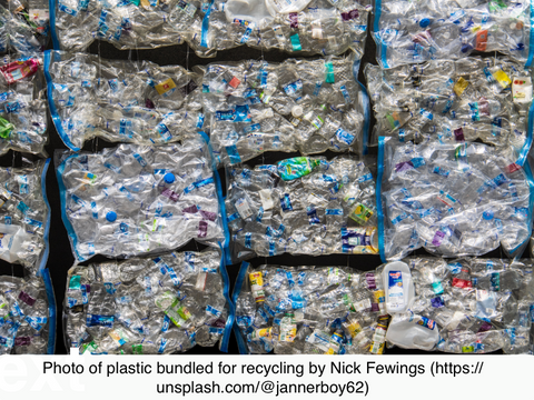 Photo of plastic bundled for recycling by Nick Fewings (https://unsplash.com/@jannerboy62)