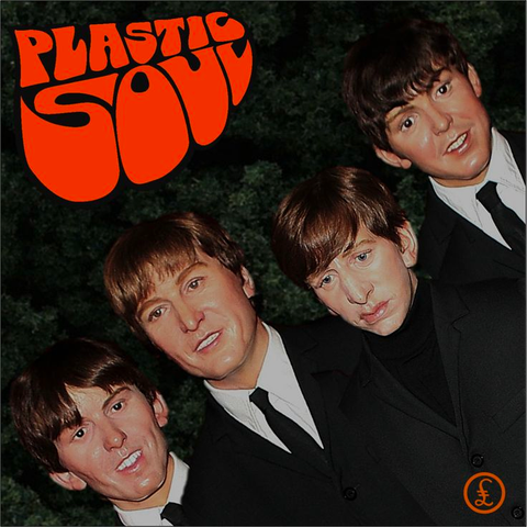 Image of wax replica of The Beatles and what some haters called their plastic soul