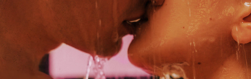 Image of 2 people kissing