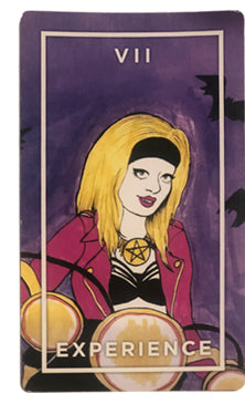 Experience Card from the Slutist Tarot Deck, shows blond woman with black headband and pink jacket riding a motorcycle