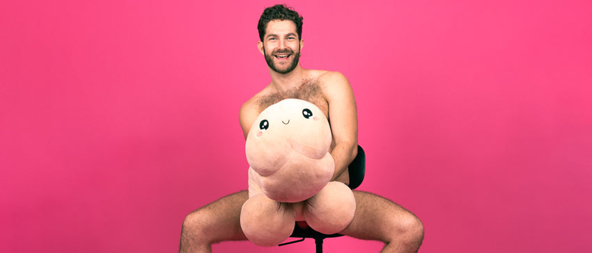 Zachary Zane naked and holding a penis shaped plushie